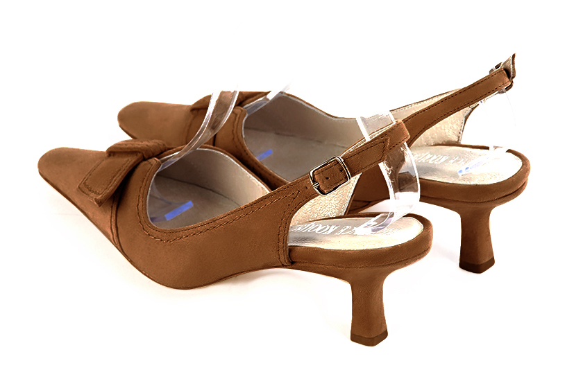 Women's caramel brown elegant slingback heels, with a bow on the front. Tapered toe. Medium spool heels - Rear view